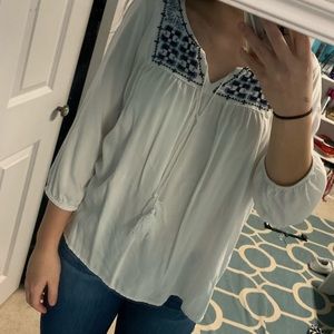 White and blue blouse